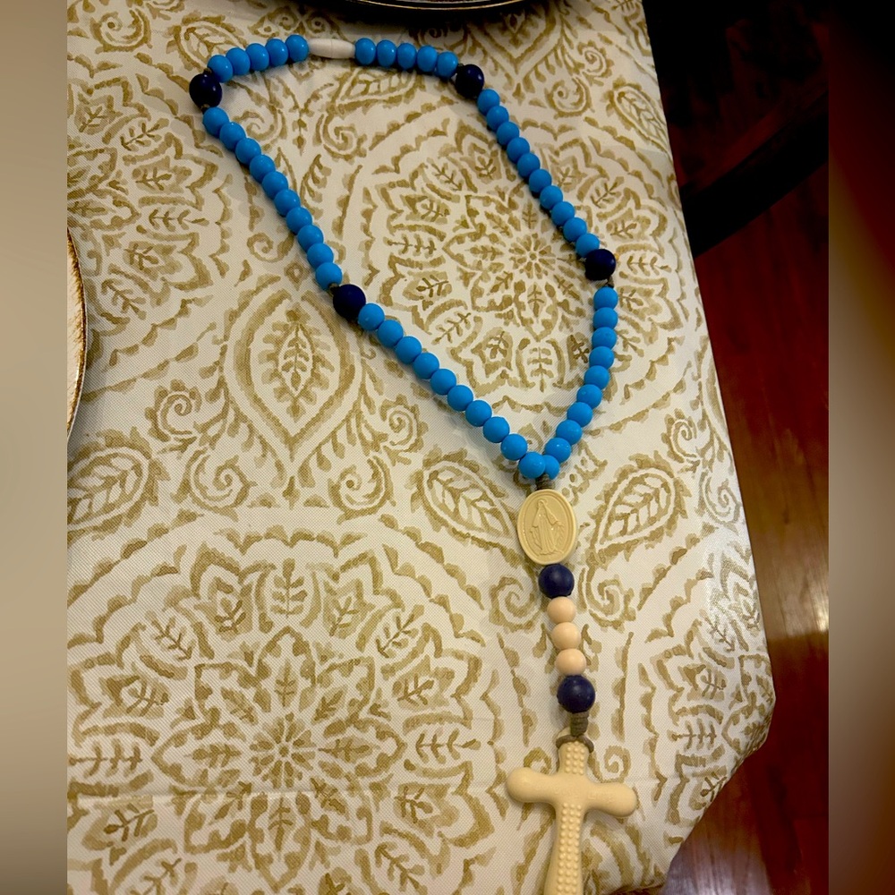Like New Blue Silicone Rosary by Chews Life. It has been sanitized in dishwasher
